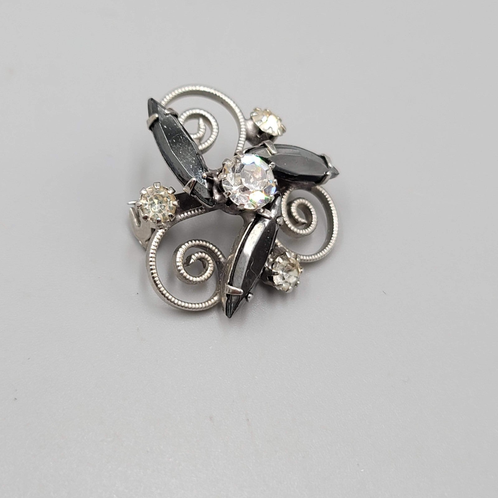 Vintage Black Hematite Rhinestone Brooch Silver tone Swirl 1 in