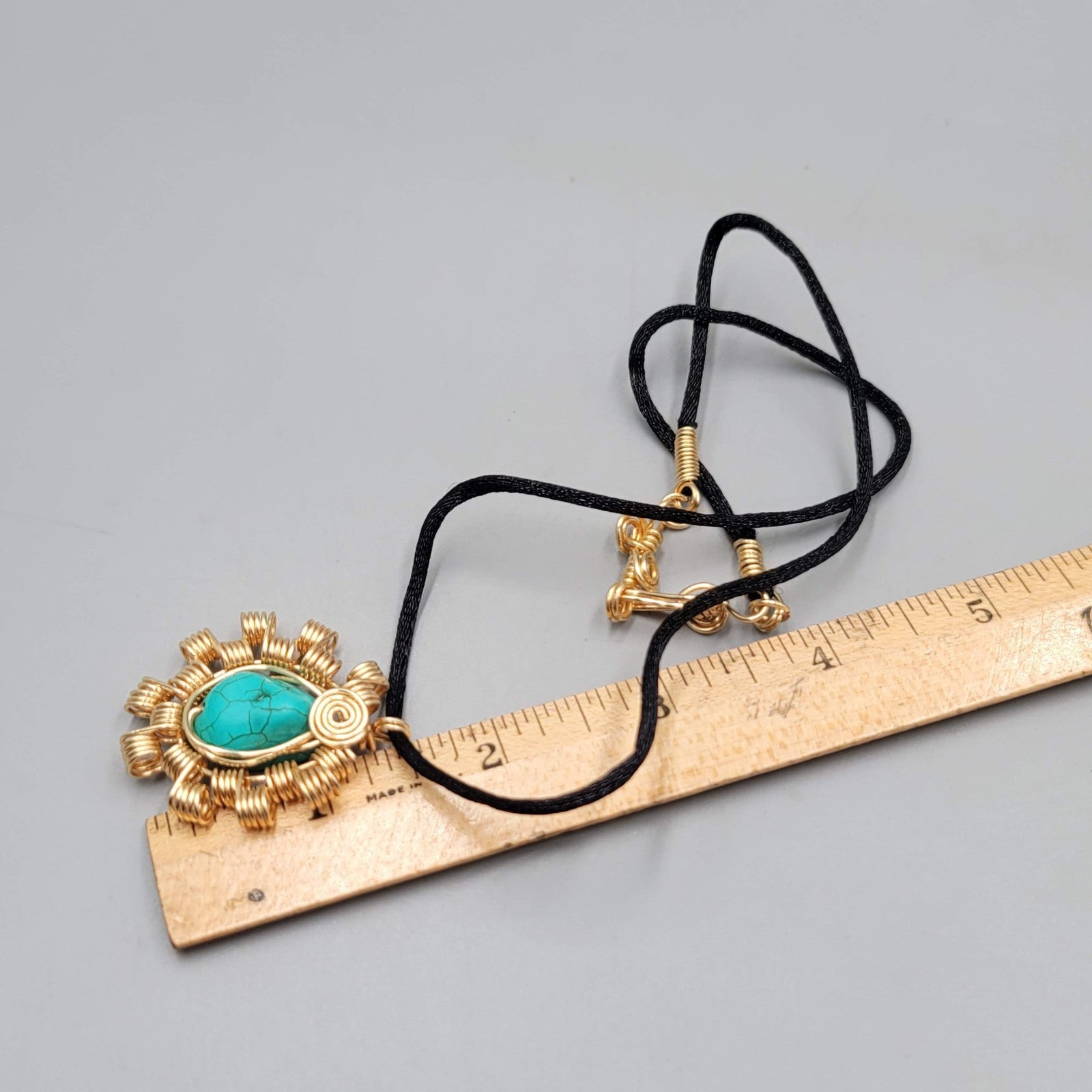 Handmade Wire Wrapped Gold tone Blue Howlite Black Cord 20"