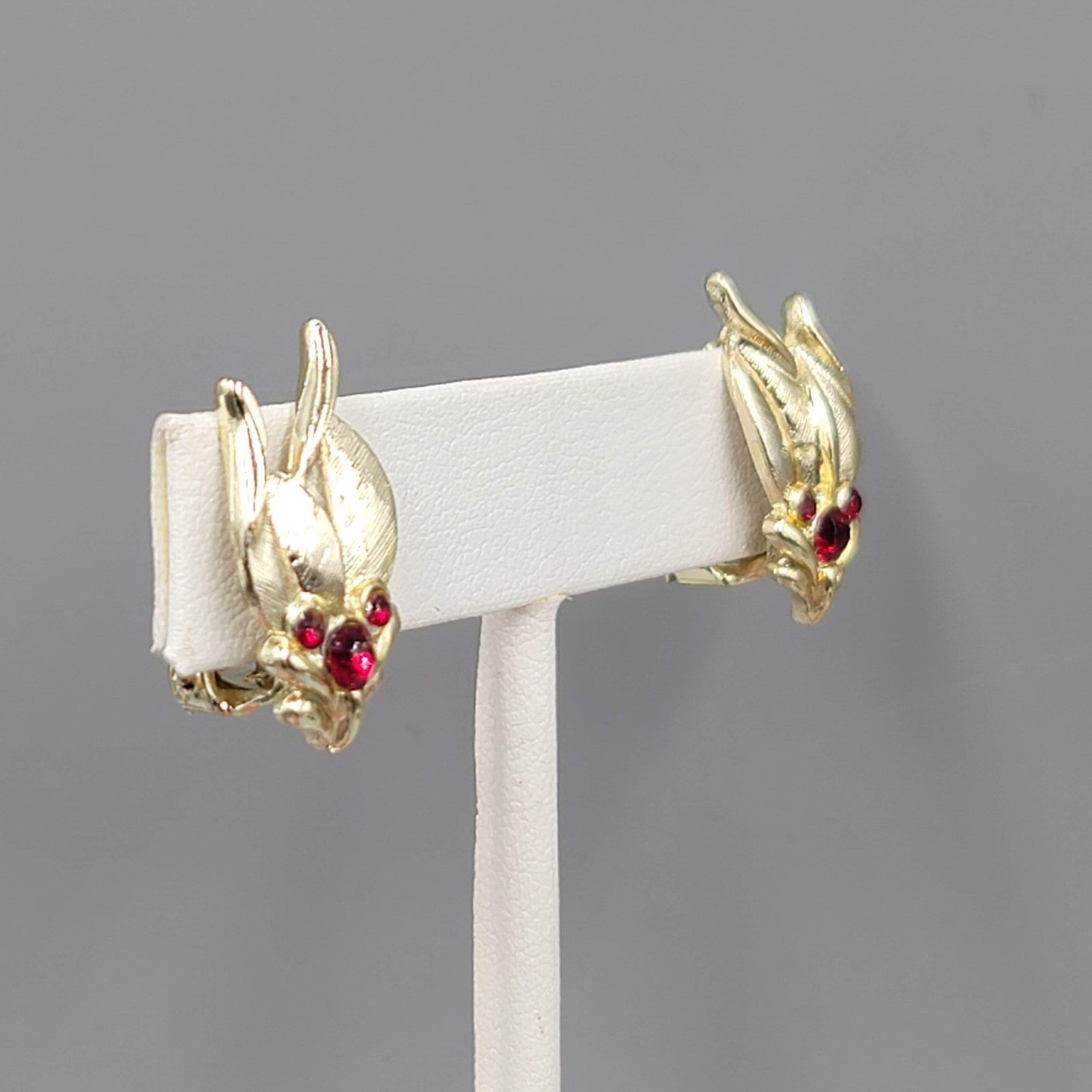 Vintage Red Rhinestone Clip on Earrings Gold tone Leaves 7/8"