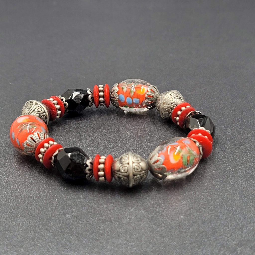 Beaded Bracelet Art Glass Red Black Silver tone Embossed Beads Elastic 6"