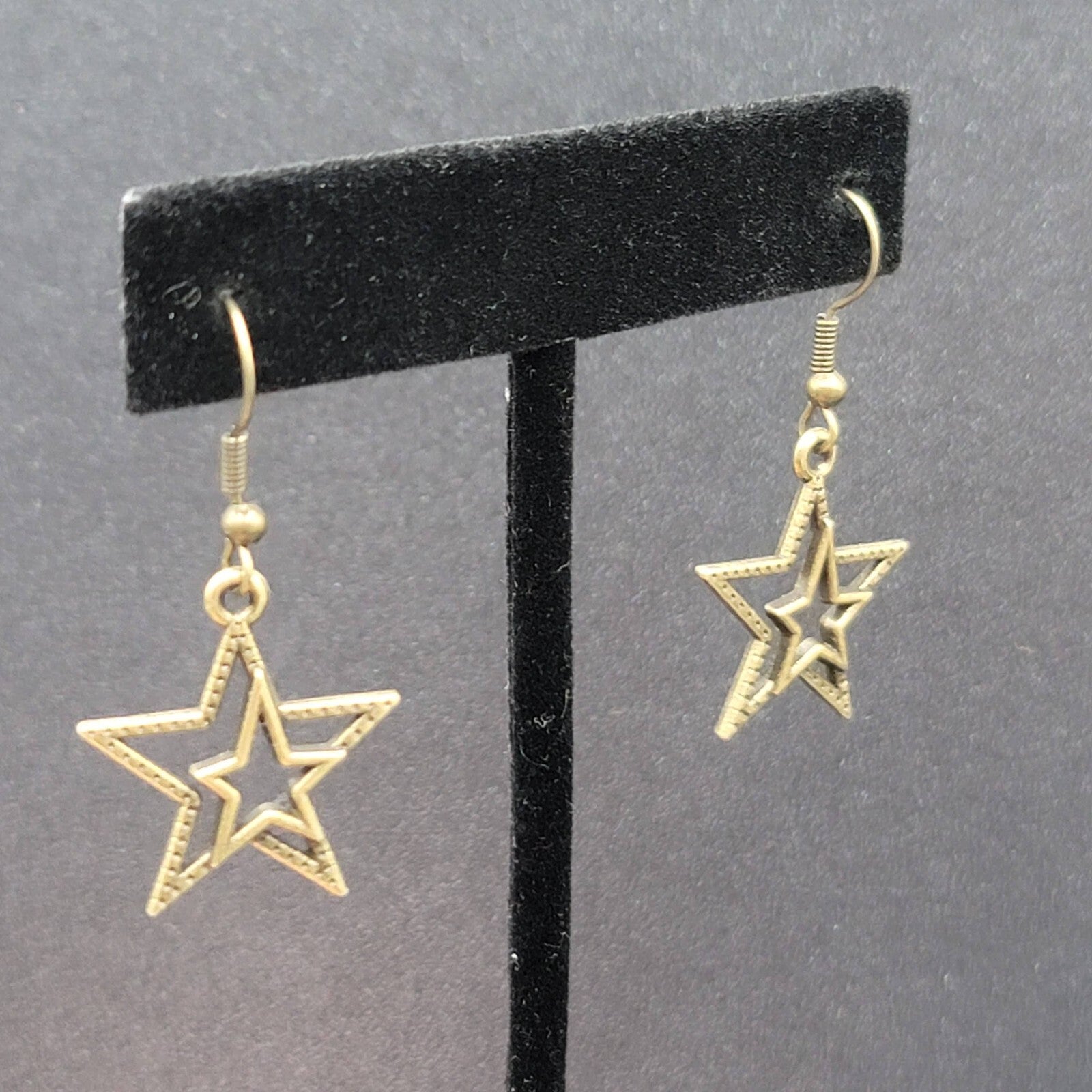 Pierced Earrings Bronze tone Double Open Star Dangle 7/8"