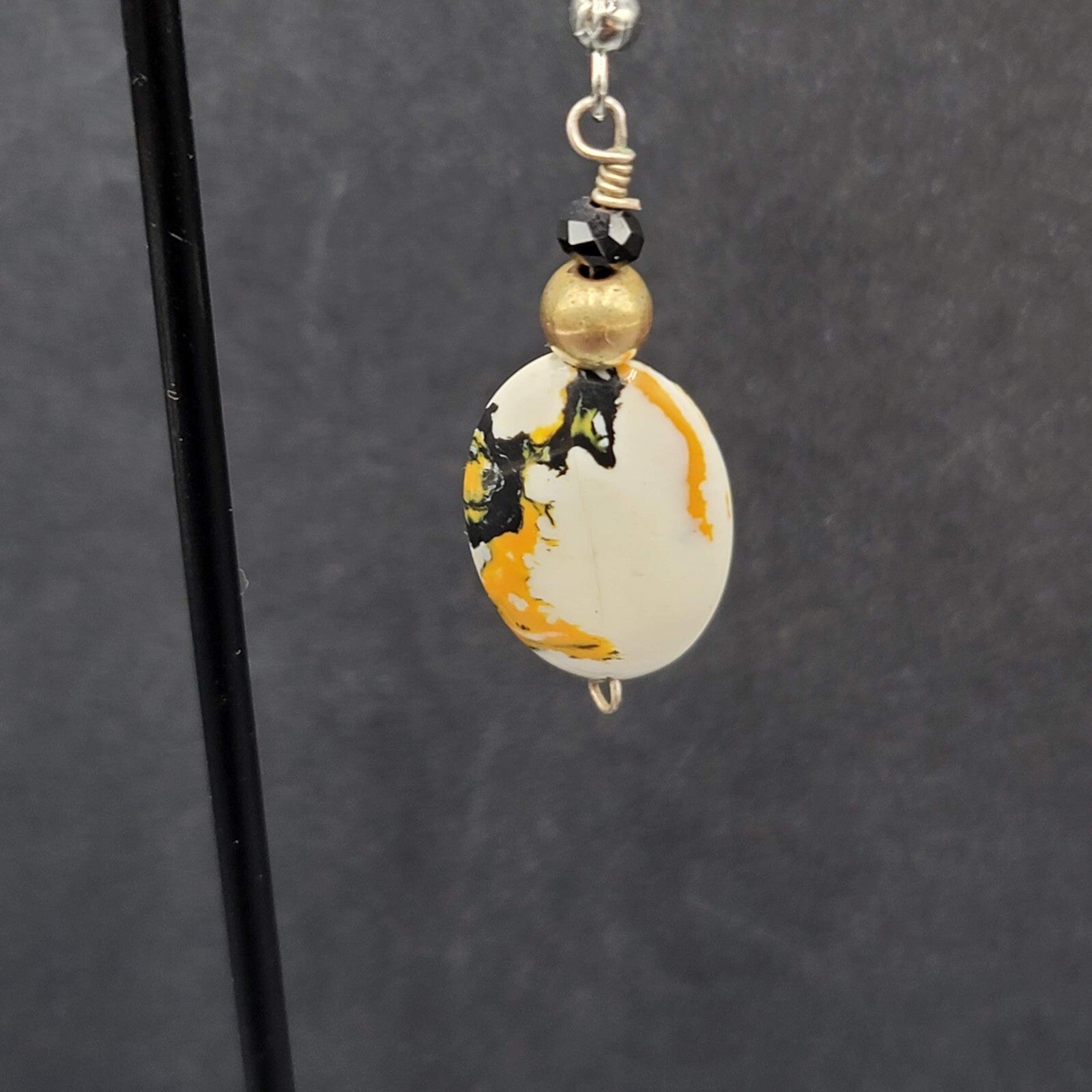 Pierced Earrings Silver tone Black White Yellow Art Glass Oval Bead Dangle 1.25"