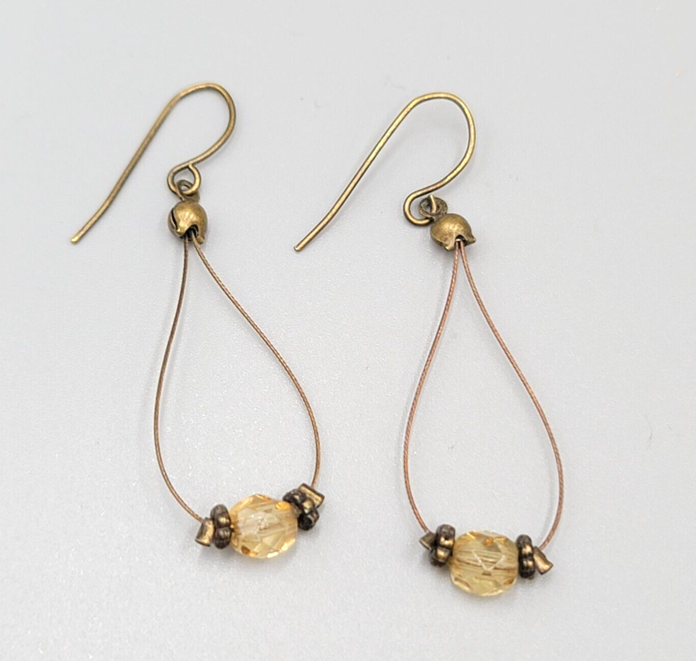 Pierced Earrings Bronze tone Teardrop Wire Yellow Glass Bead Dangle 1.5"