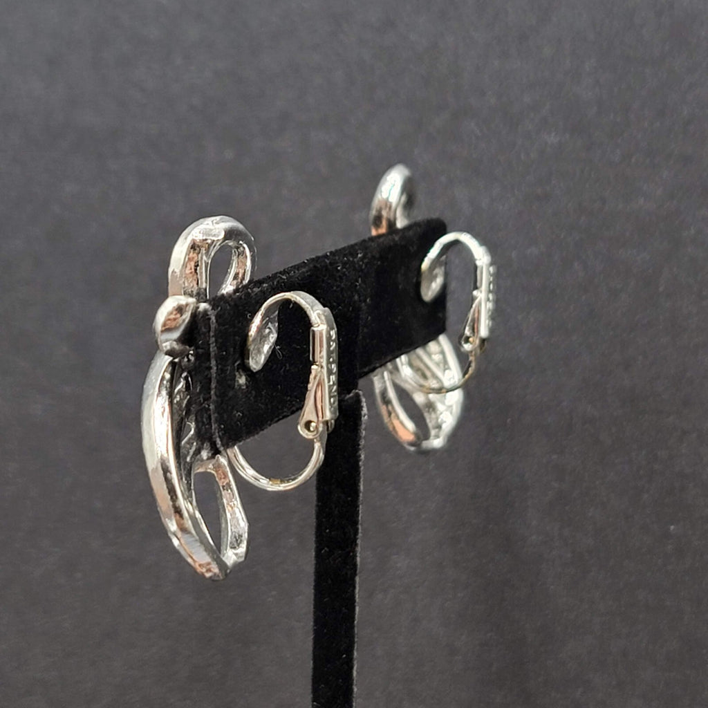 Vintage Clip on Earrings Pat Pend Silver tone Swirl Climber 1.25"