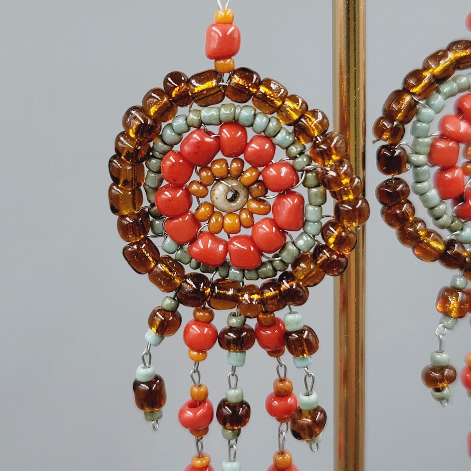 Medallion Bead Pierced Earrings Silver tone Dangle Orange Brown Blue 2.25"