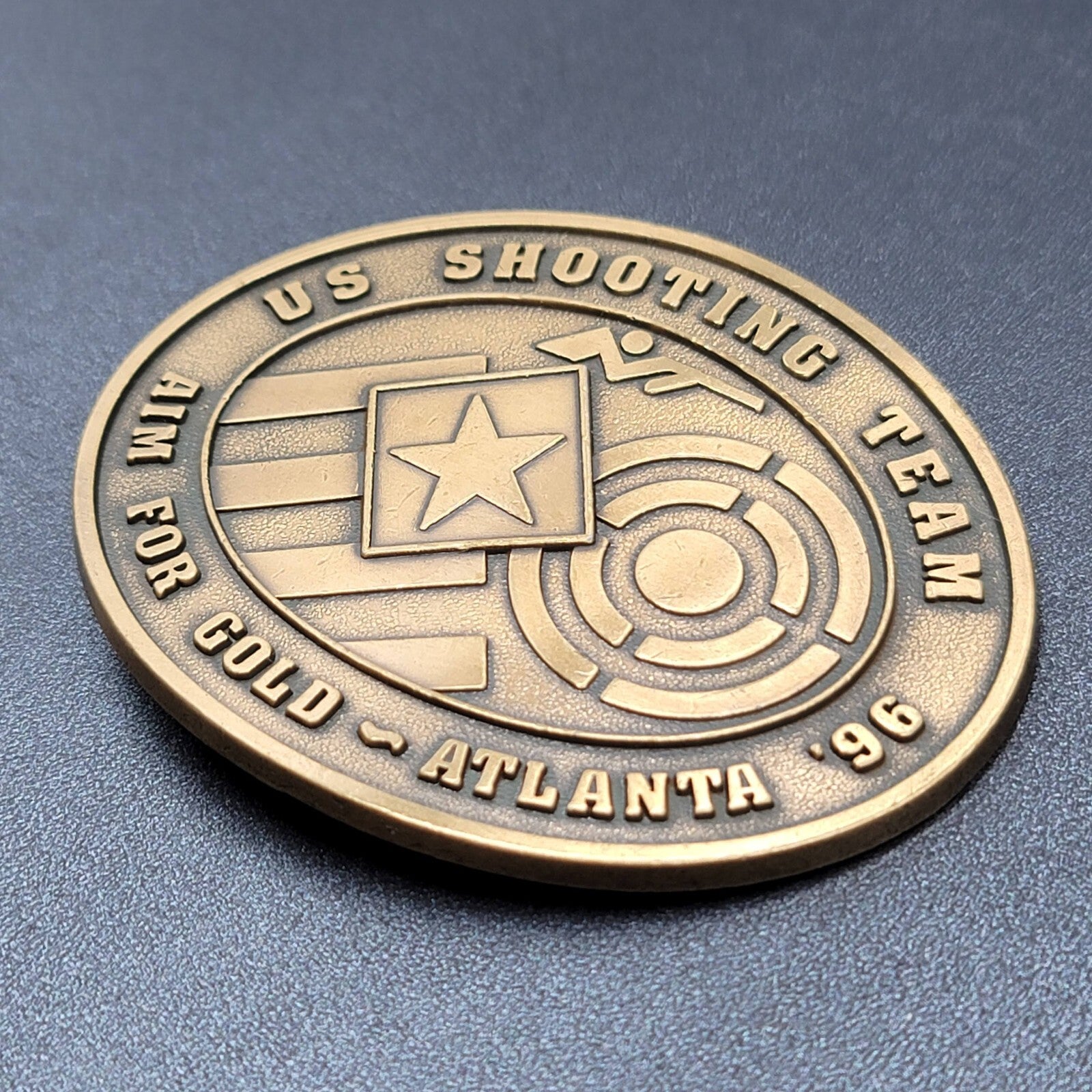 1996 US OLYMPICS ATLANTA SHOOTING TEAM BELT BUCKLE AIM FOR GOLD