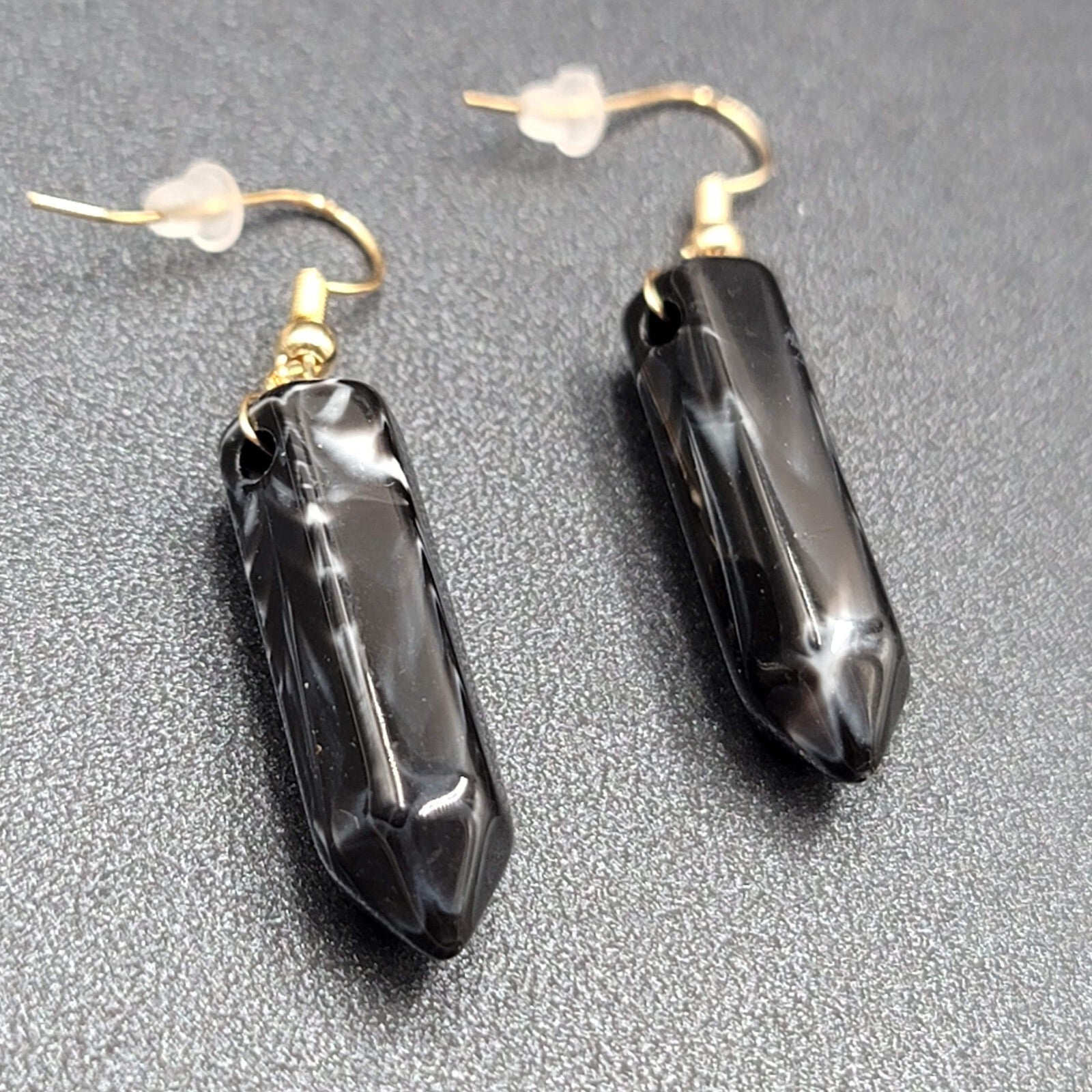 Pierced Earrings Black Marbled Resin Spike Pendulum Dangle Gold tone Hook 1.25"