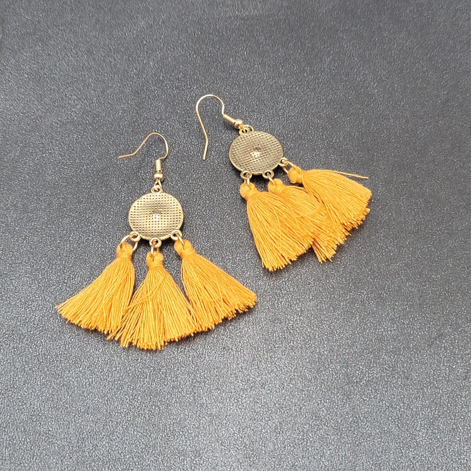Pierced Earrings Gold tone Orange Tassel Rhinestone Medallion Dangle 1.75"