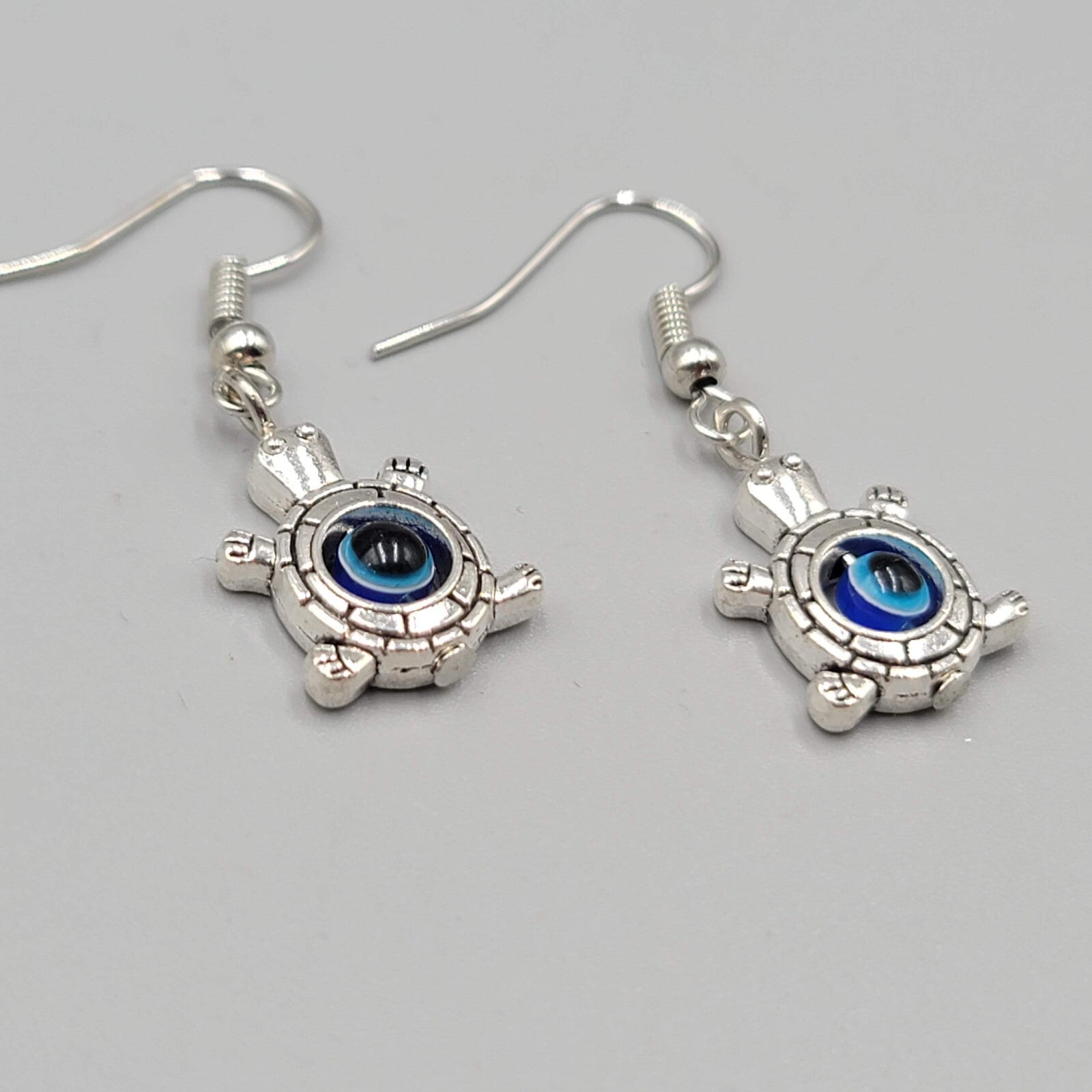 Turtle Evil Eye Pierced Earrings Silver tone Blue Bead Dangle 3/4"