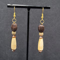 Pierced Earrings Gold tone Wood Hand Carved Beads Dangle 2"