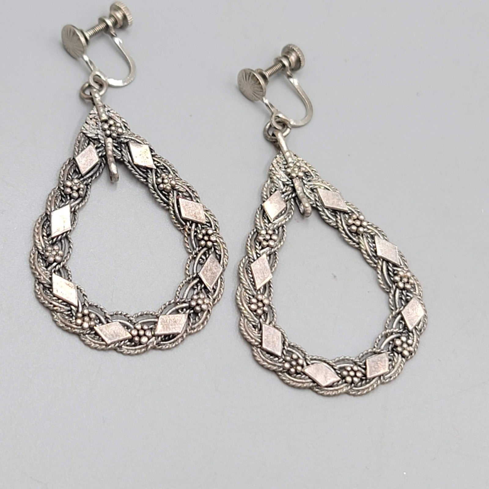 Vintage Open Teardrop Embossed Clip on Earrings Silver tone Dangle 2 in