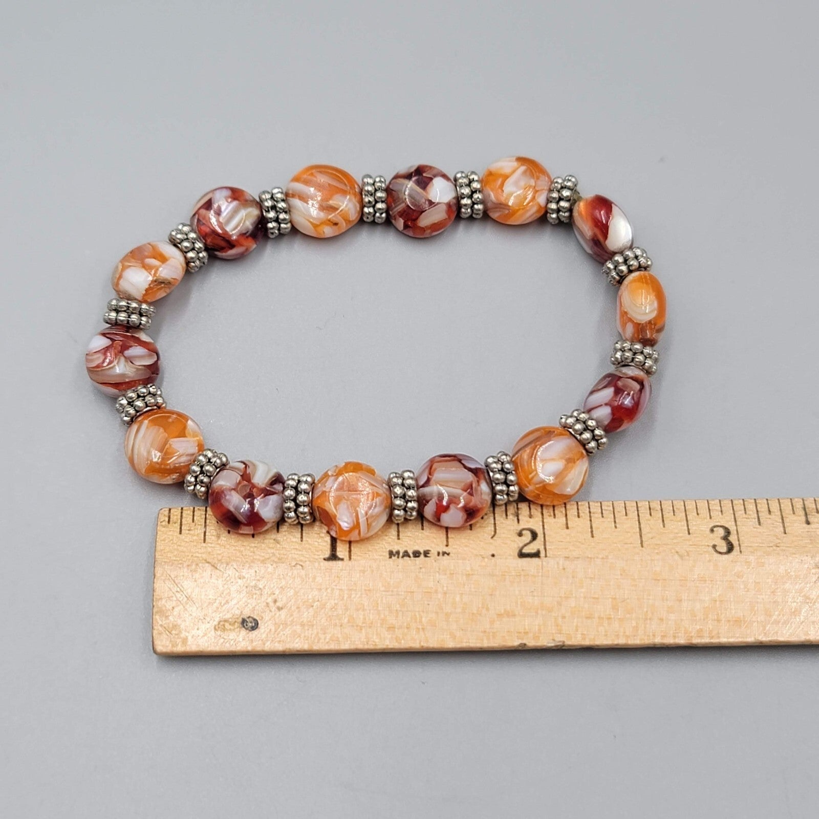 Glass Bead Stretch Bracelet Red White Orange White Silver tone 7"