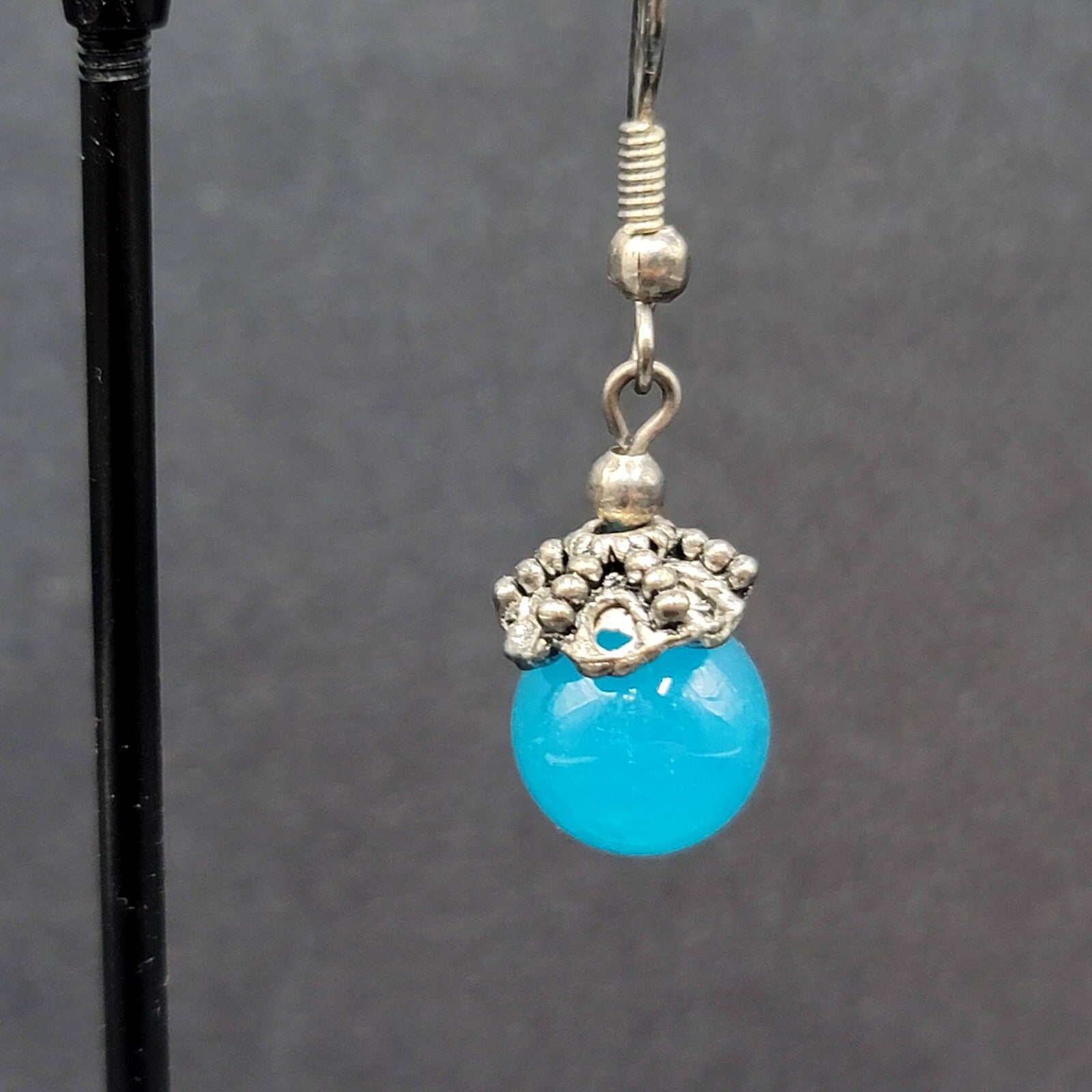 Pierced Earrings Silver tone Filigree Capped Blue Glass Bead Dangle 3/4"