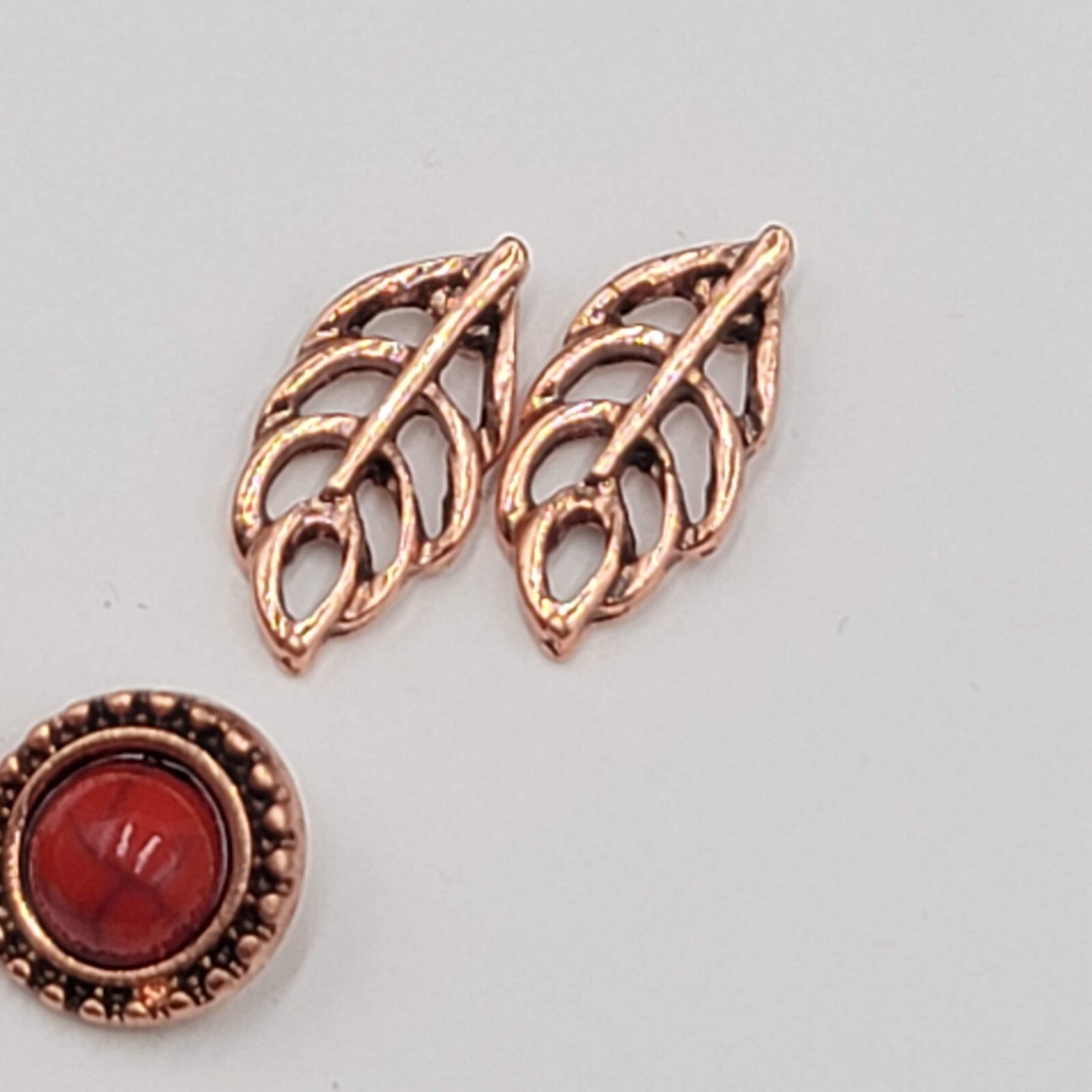 Pierced Earrings Copper tone Studs Open Heart Leaf Red Accent