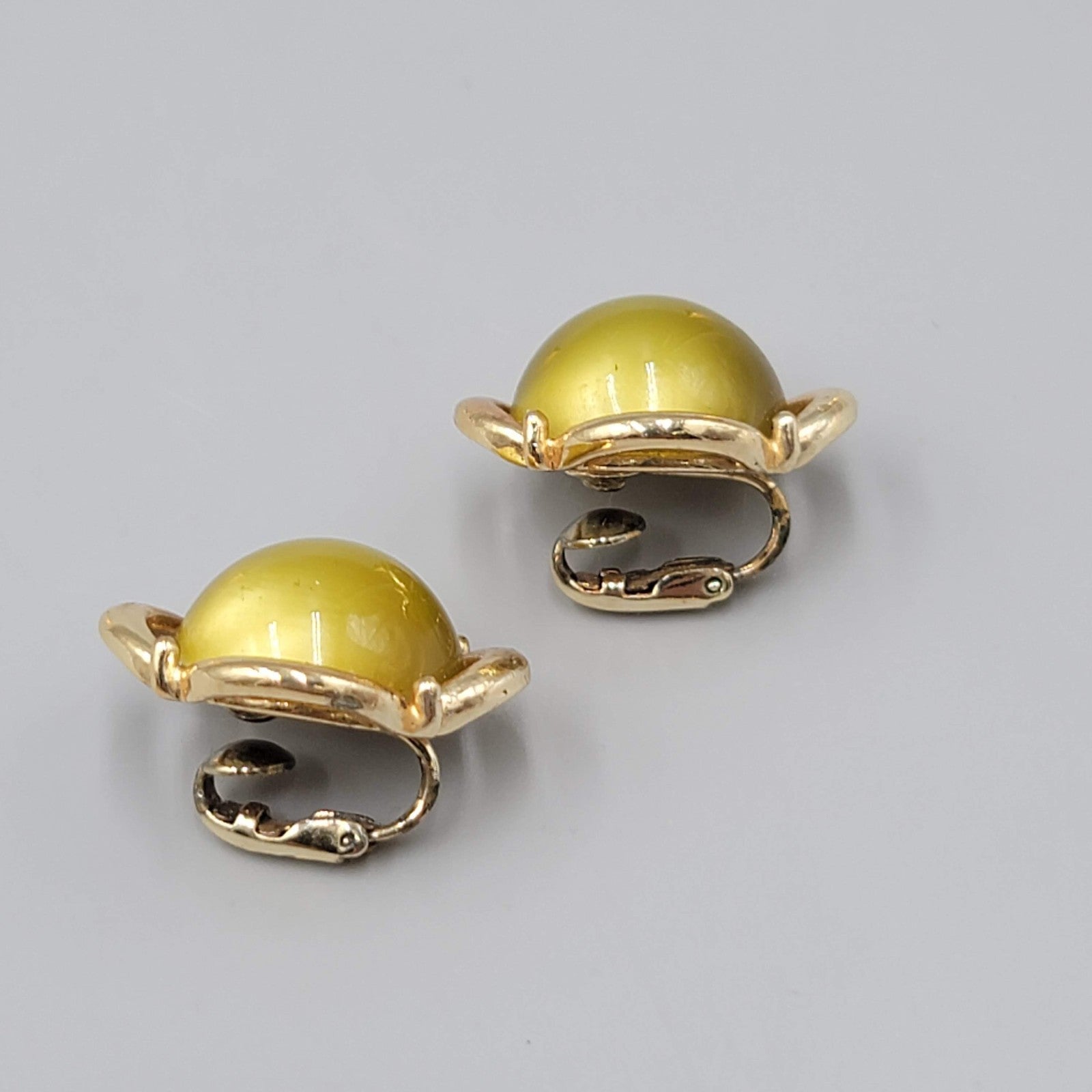Vintage Olive Green Moon Glow Clip on Earrings Lucite Dome Gold tone 1 in