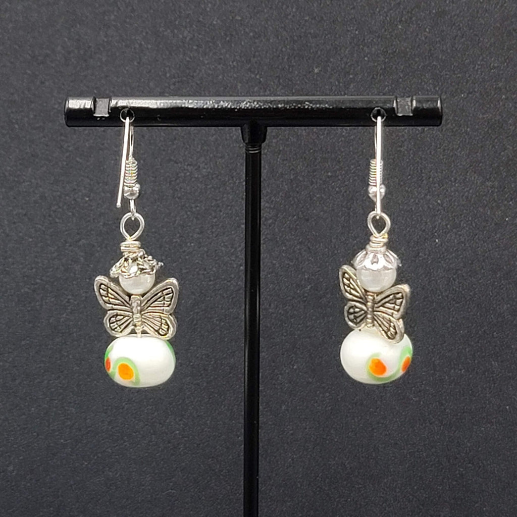 Pierced Earrings Silver tone Angel White Art Glass Bead Dangle 1"