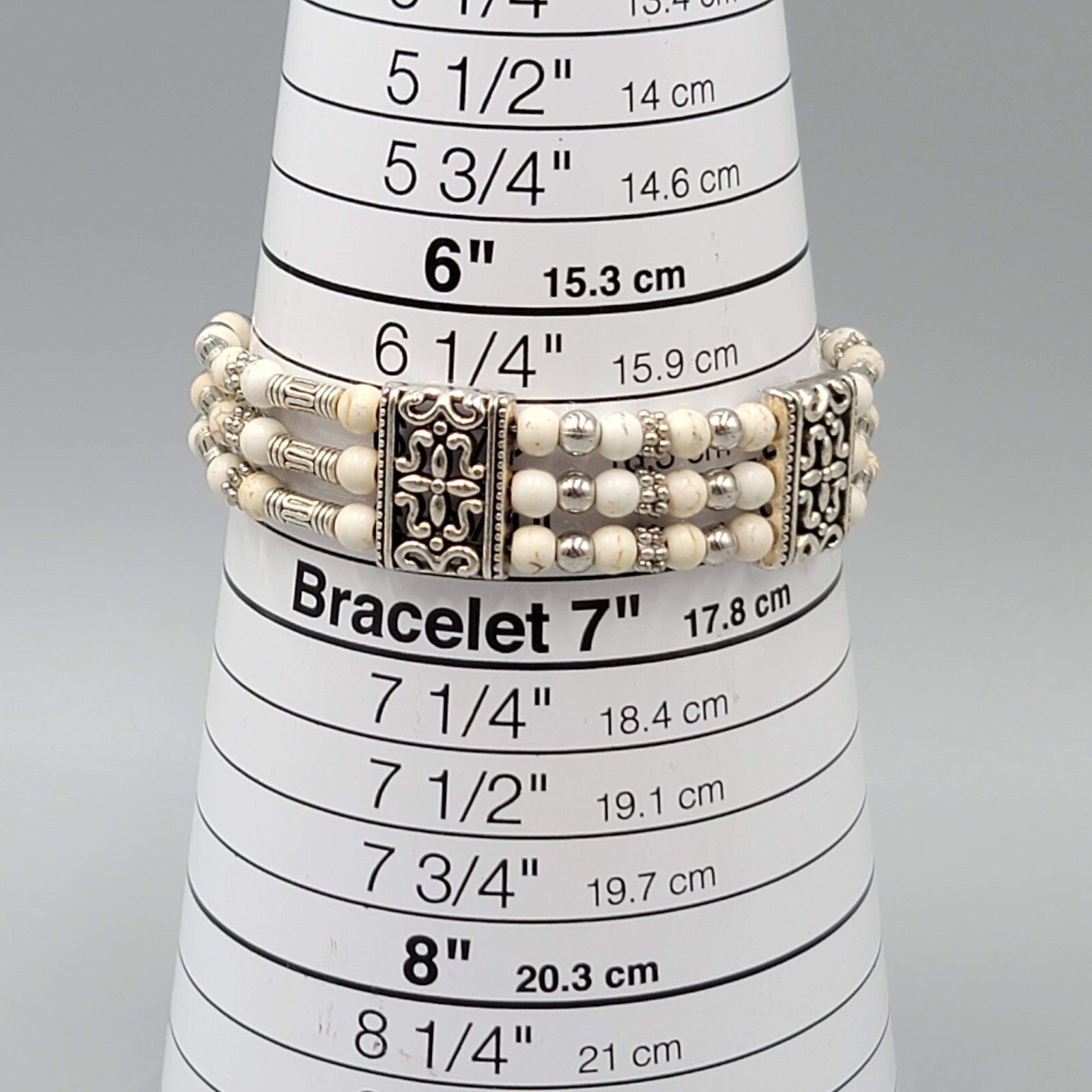 White Stone Bead Bracelet Triple Strand Silver tone Feather Charm 6.75"