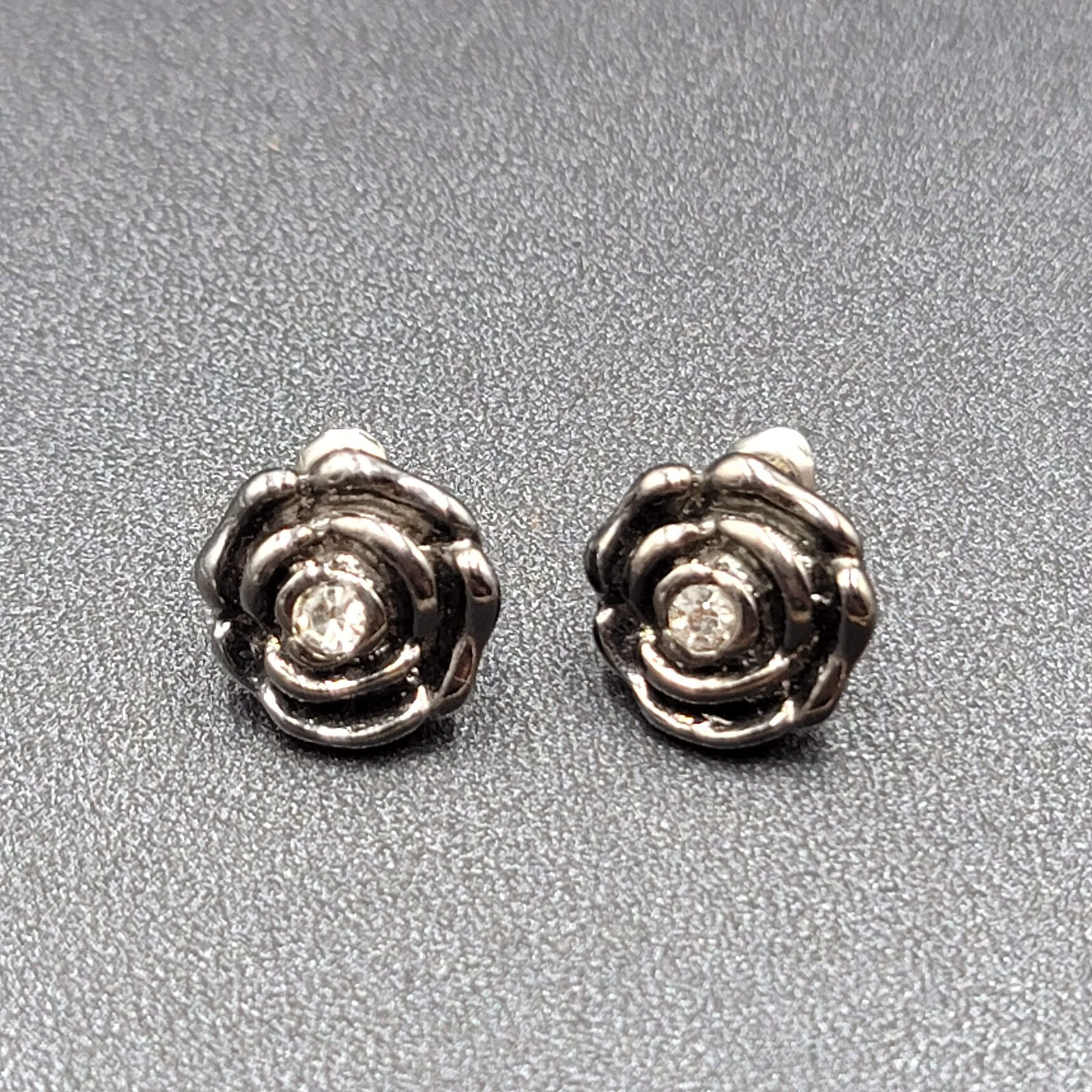 Pierced Earrings Black Metal Rose Flower Studs Crystal Center 1/2"