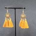 Pierced Earrings Gold tone Orange Tassel Rhinestone Medallion Dangle 1.75"