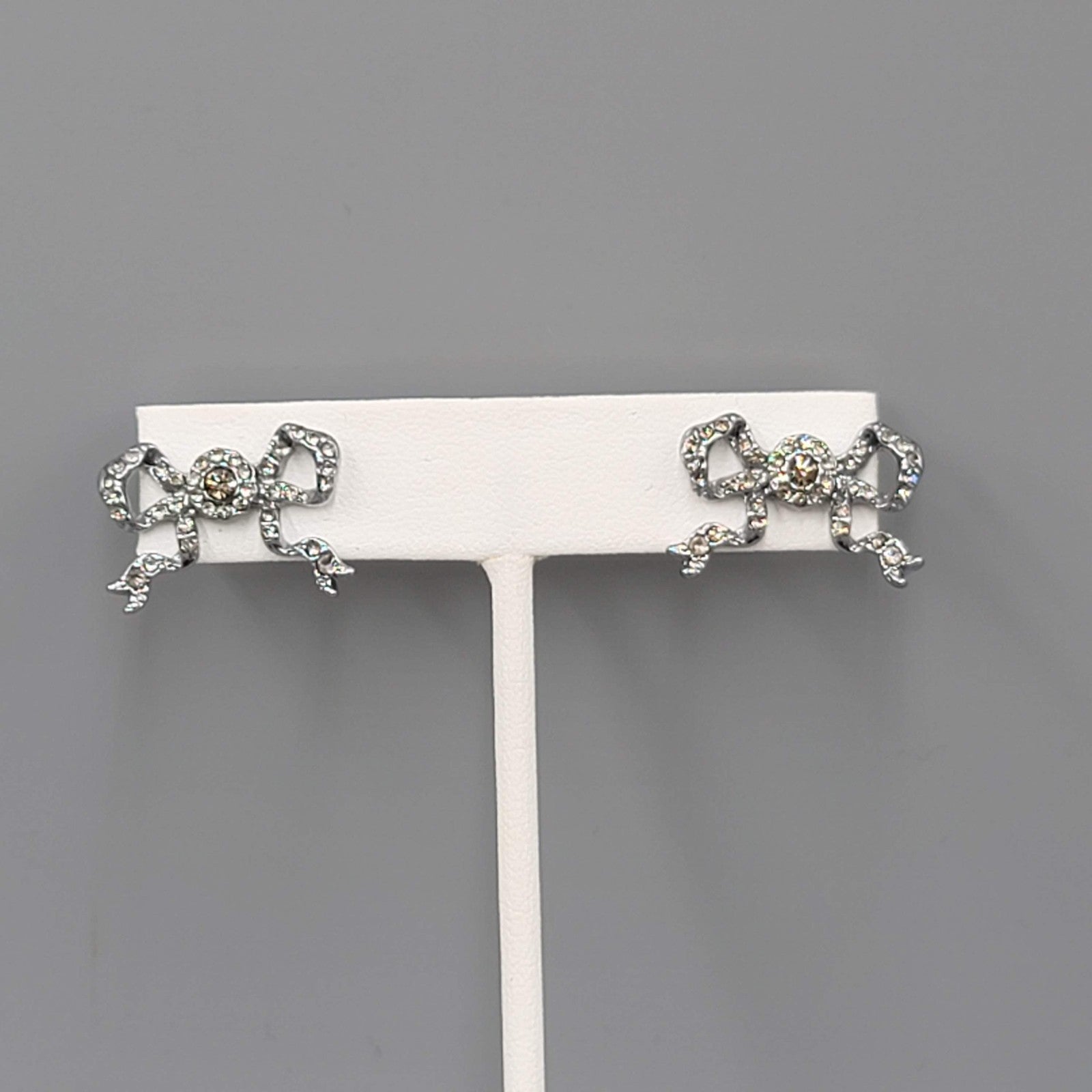 Rhinestone Bow Pierced Earrings Gunmetal Gray Drop 5/8 in