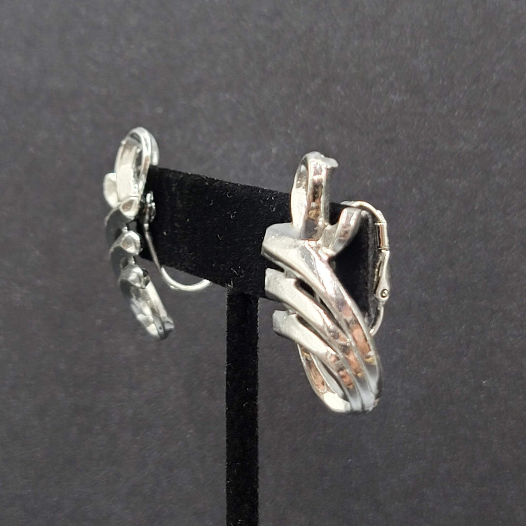 Vintage Clip on Earrings Pat Pend Silver tone Swirl Climber 1.25"