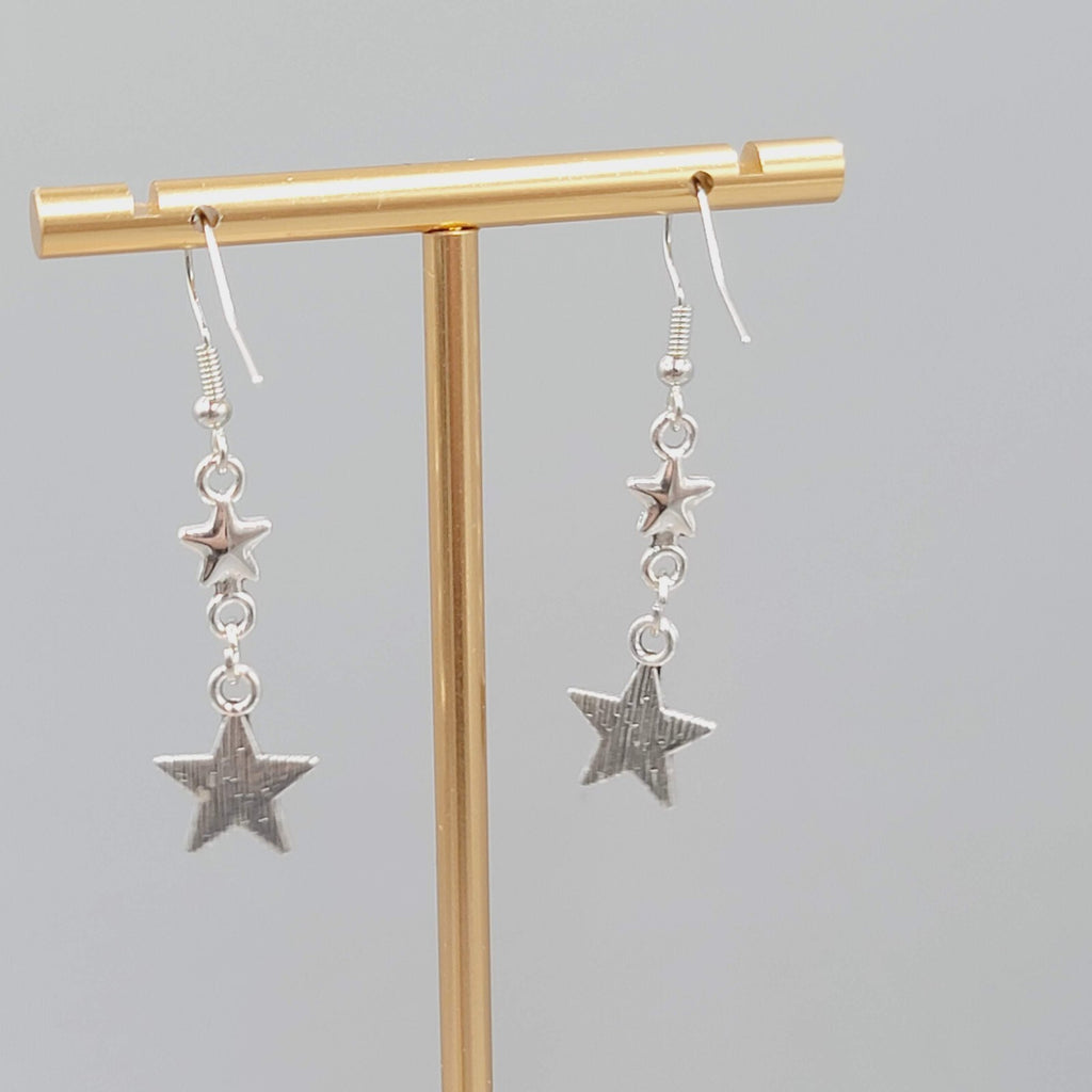 Stars Pierced Earrings Silver tone Embossed Dangle New 1 1/8"