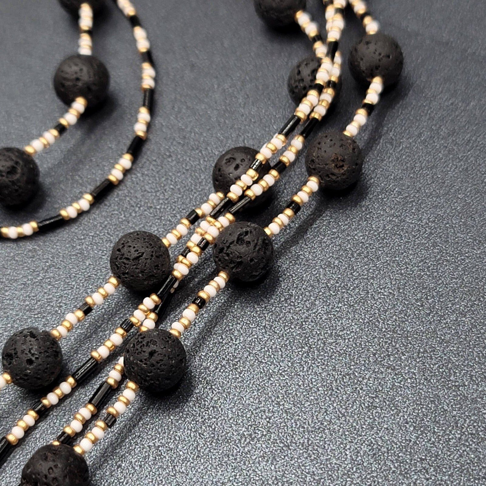 Beaded Necklace Bracelet Earrings Set Gold tone White Black Lava Bead Set