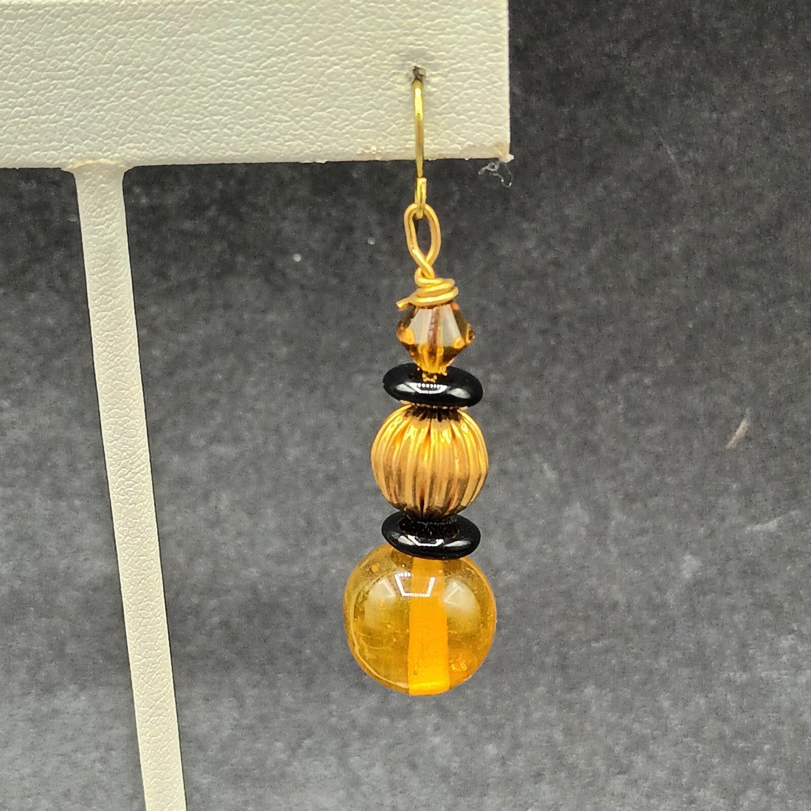 Pierced Earrings Gold tone Orange Black Beaded Statement Dangle 1.5"