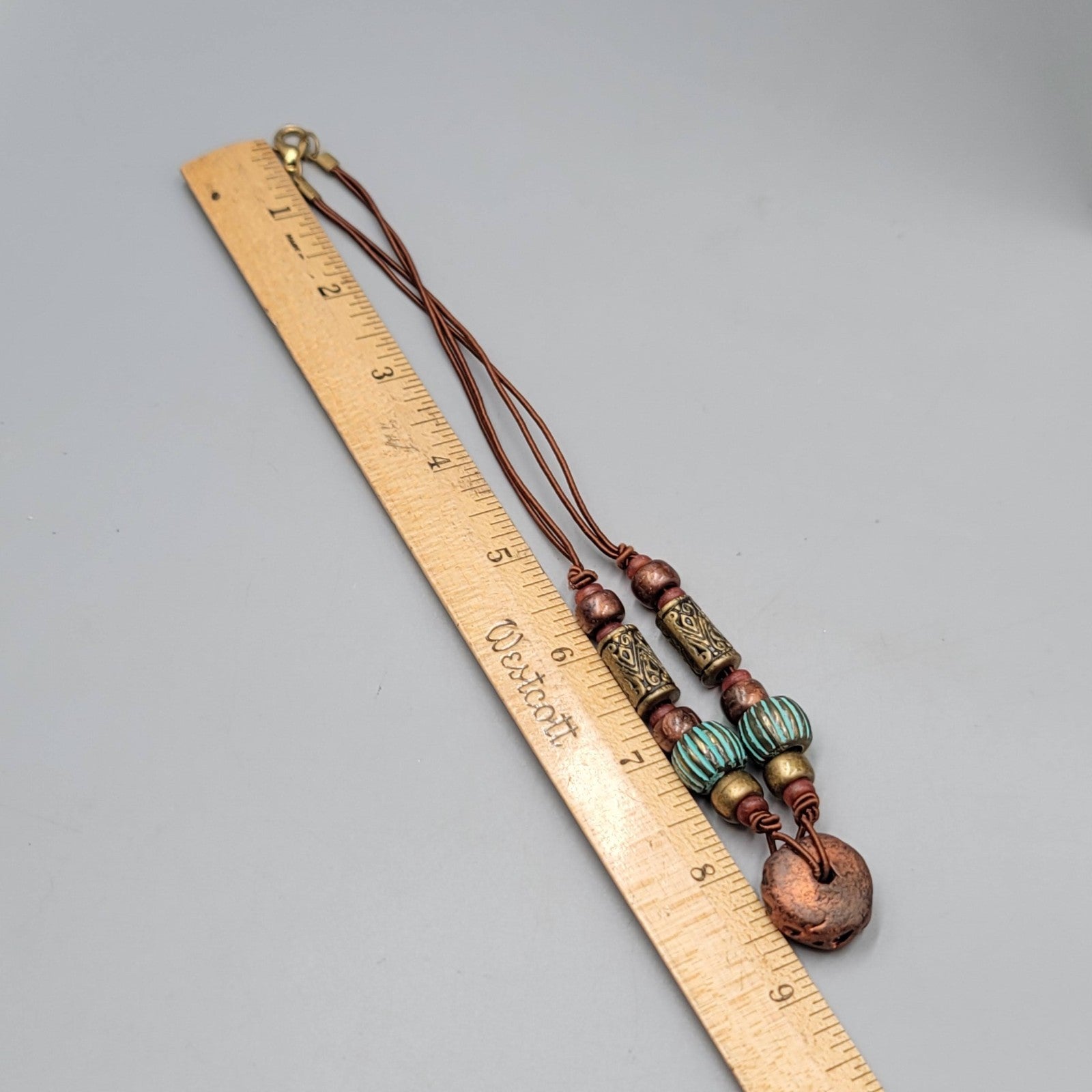 Artisan Tribal Bead Necklace Blue Bronze Colors Brown Cord 16 in